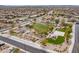 Aerial view of the community playground showing the basketball court, play area, and surrounding homes at 22065 W Twilight Trl, Buckeye, AZ 85326