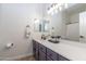 Bathroom with modern vanity, neutral paint, and bath tub shower at 22065 W Twilight Trl, Buckeye, AZ 85326