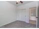 Clean bedroom with closet and neutral carpeting at 22065 W Twilight Trl, Buckeye, AZ 85326