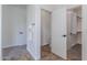 Hallway features a linen closet and a walk in toilet room at 22065 W Twilight Trl, Buckeye, AZ 85326