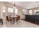 Charming dining area with tile floors and natural light at 23935 S Sunvista Dr, Sun Lakes, AZ 85248