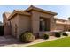 Attractive home with desert landscaping, neutral paint, and an attached multi-car garage at 23935 S Sunvista Dr, Sun Lakes, AZ 85248