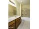 Bathroom featuring sink, tile flooring, toilet, shower-tub combo, and safety bar at 2662 S Springwood Blvd # 467, Mesa, AZ 85209