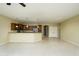 Bright living area featuring tile flooring, an open layout, and seamless transition to the kitchen at 2662 S Springwood Blvd # 467, Mesa, AZ 85209