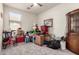 Cluttered bedroom with a window at 273 S 152Nd Ave, Goodyear, AZ 85338