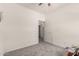 Empty bedroom with neutral walls and carpet at 273 S 152Nd Ave, Goodyear, AZ 85338