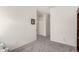 Empty bedroom with neutral carpet and walls at 273 S 152Nd Ave, Goodyear, AZ 85338