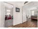 Hallway that leads to carpeted and wood-look floor rooms at 273 S 152Nd Ave, Goodyear, AZ 85338