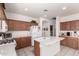 Bright, spacious kitchen with quartz countertops and stainless steel appliances at 273 S 152Nd Ave, Goodyear, AZ 85338