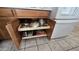 Kitchen cabinet with pull out shelving to maximize storage and accessibility for efficient organization of cookware and utensils at 273 S 152Nd Ave, Goodyear, AZ 85338