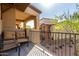 Private balcony with seating, offering views of the surrounding neighborhood at 2821 S Skyline Dr # 107, Mesa, AZ 85212
