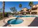 Resort-style community pools with a hot tub and palm trees at 2821 S Skyline Dr # 107, Mesa, AZ 85212