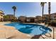 Inviting community pool area with comfortable seating and well-maintained landscaping at 2821 S Skyline Dr # 107, Mesa, AZ 85212