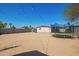 The backyard offers a trampoline and a large area of space at 3009 N 81St Ln, Phoenix, AZ 85033