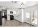 Modern kitchen with white cabinetry, stainless steel appliances, and ample counter space at 3009 N 81St Ln, Phoenix, AZ 85033