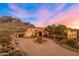 An aerial view of the front entrance with desert landscaping at 3307 N Mountain View Rd, Apache Junction, AZ 85119