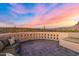 Relaxing rooftop deck featuring comfortable outdoor seating and panoramic desert views at sunset at 3307 N Mountain View Rd, Apache Junction, AZ 85119