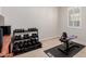 Workout area featuring free weights, bench, and natural light at 3816 E Rakestraw Ln, Gilbert, AZ 85298