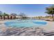 Neighborhood park area with a splash pad and ample seating for community gatherings at 3816 E Rakestraw Ln, Gilbert, AZ 85298