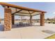 Covered picnic area with tables offering a comfortable space for outdoor gatherings and community events at 3816 E Rakestraw Ln, Gilbert, AZ 85298