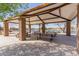 Outdoor picnic area with a covered pavilion and picnic tables for community gatherings and outdoor dining at 3816 E Rakestraw Ln, Gilbert, AZ 85298