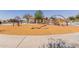 Community playground featuring slides, swings, and other play structures, creating a fun and active environment for children at 3816 E Rakestraw Ln, Gilbert, AZ 85298