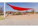 Community playground with a sunshade covering, offering recreational play areas for children in the neighborhood at 3816 E Rakestraw Ln, Gilbert, AZ 85298