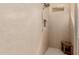 Detailed close-up of the tile shower, featuring seating and tiled surround at 3816 E Rakestraw Ln, Gilbert, AZ 85298