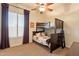 Bedroom with bunk beds, window, dark purple curtains, and carpet flooring at 3948 E Vallejo Dr, Gilbert, AZ 85298