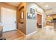 Welcoming entryway featuring wood-look flooring, neutral walls and white trim at 3948 E Vallejo Dr, Gilbert, AZ 85298