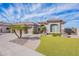 Stunning single-story home boasts lush turf, mature landscaping, and gated entry at 3948 E Vallejo Dr, Gilbert, AZ 85298