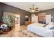 Serene main bedroom with neutral tones and a stylish ensuite bathroom for added convenience at 3948 E Vallejo Dr, Gilbert, AZ 85298