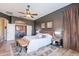 Elegant primary bedroom featuring a cozy sitting area and refined decor, creating a luxurious retreat at 3948 E Vallejo Dr, Gilbert, AZ 85298