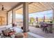 Inviting outdoor kitchen with built in grill, bar seating, and shaded pergola, perfect for entertaining at 3948 E Vallejo Dr, Gilbert, AZ 85298