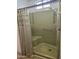 Bathroom showing a tiled stand up shower with included seating at 4065 E University Dr # 83, Mesa, AZ 85205