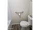 Bathroom displaying a toilet with a bidet and an accessible grab bar at 4065 E University Dr # 83, Mesa, AZ 85205