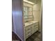 Bathroom showing a large mirror and a white marble sink and cabinets at 4065 E University Dr # 83, Mesa, AZ 85205