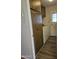 Laundry Room featuring a washer, dryer, storage cabinets, and hard wood floors at 4065 E University Dr # 83, Mesa, AZ 85205