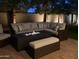 Inviting backyard featuring a fire pit and a cozy seating area, perfect for outdoor entertaining at 4197 E Rawhide St, Gilbert, AZ 85296