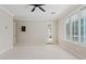 A very spacious bedroom with natural light, and neutral colors, features shutters at 4197 E Rawhide St, Gilbert, AZ 85296