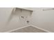 An empty laundry room with tile flooring, a shelf, and hookups at 4197 E Rawhide St, Gilbert, AZ 85296