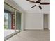 Bright living room with tile floors and sliding glass doors to the outside patio at 4197 E Rawhide St, Gilbert, AZ 85296