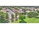 An aerial view showcases the neighborhood's layout, complete with lush green spaces and well-maintained homes at 4235 W Harrison St, Chandler, AZ 85226
