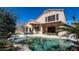 The backyard pool has mature shade trees and a covered outdoor seating area at 4235 W Harrison St, Chandler, AZ 85226