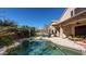 View of the backyard with the pool, patio, and seating area of this lovely home at 4235 W Harrison St, Chandler, AZ 85226