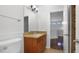 Bathroom featuring granite counters and a wood vanity, with an attached powder room at 4235 W Harrison St, Chandler, AZ 85226