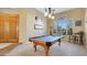 Entertainment room showcasing a billiard table, built in bar, and ample space for recreation at 4235 W Harrison St, Chandler, AZ 85226