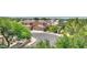Elevated view of beautiful homes with tile roofs, surrounded by mature trees and landscaping in this Arizona neighborhood at 4235 W Harrison St, Chandler, AZ 85226