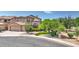 Inviting home with a well-manicured front yard, desert landscaping, and a spacious two-car garage at 4235 W Harrison St, Chandler, AZ 85226