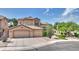 Charming single-Gathering home with a three-car garage, desert landscaping, and a well-maintained yard at 4235 W Harrison St, Chandler, AZ 85226